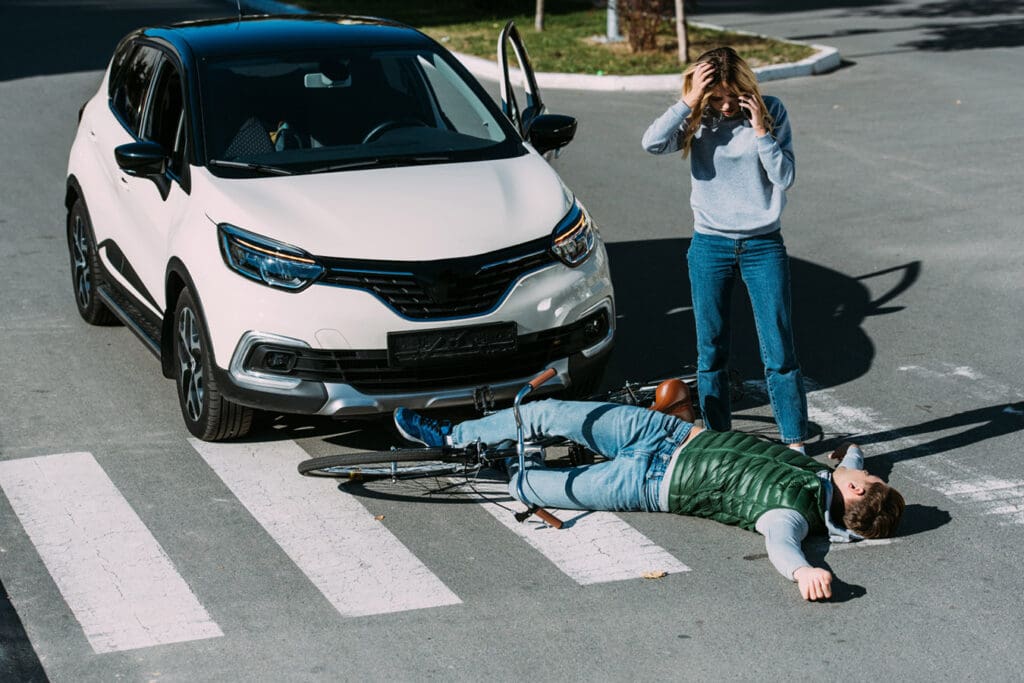 Woman-distraught-after-hitting-cyclist